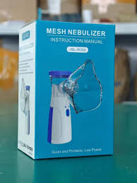 Nebulizer machine showing 8ml medication cup and battery operation